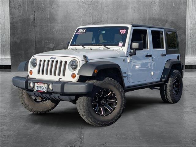 used 2013 Jeep Wrangler Unlimited car, priced at $15,955