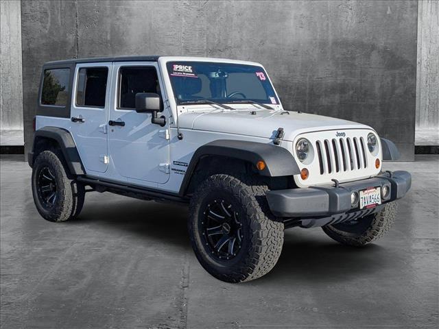 used 2013 Jeep Wrangler Unlimited car, priced at $15,955