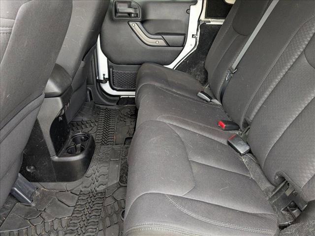 used 2013 Jeep Wrangler Unlimited car, priced at $17,455
