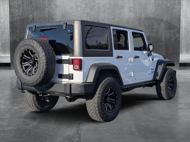 used 2013 Jeep Wrangler Unlimited car, priced at $15,955