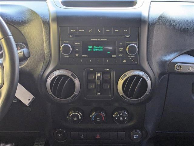 used 2013 Jeep Wrangler Unlimited car, priced at $15,955