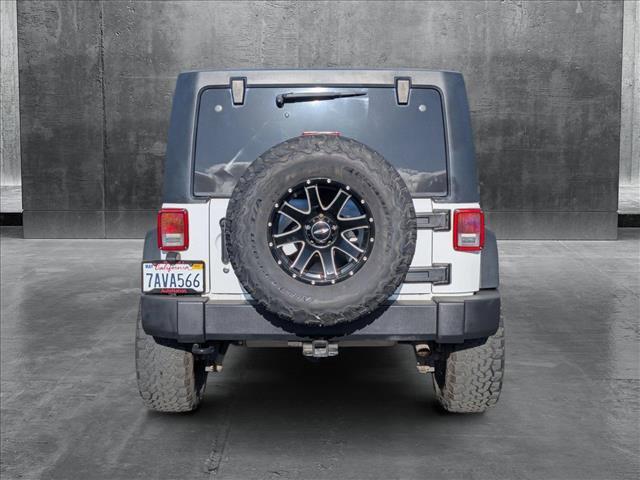 used 2013 Jeep Wrangler Unlimited car, priced at $15,955