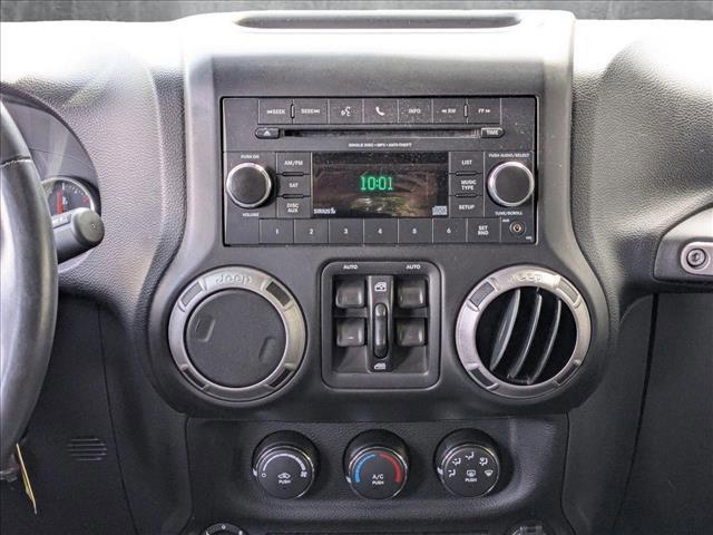 used 2013 Jeep Wrangler Unlimited car, priced at $17,455