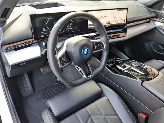 used 2025 BMW 550e car, priced at $69,888