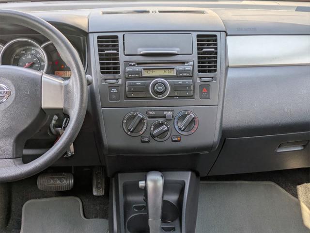 used 2010 Nissan Versa car, priced at $5,000