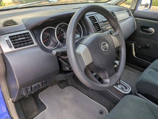 used 2010 Nissan Versa car, priced at $5,000