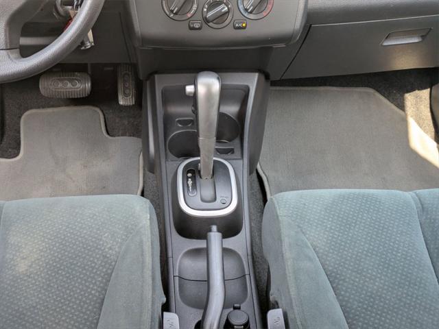 used 2010 Nissan Versa car, priced at $5,000