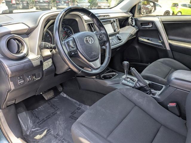used 2018 Toyota RAV4 car, priced at $15,000