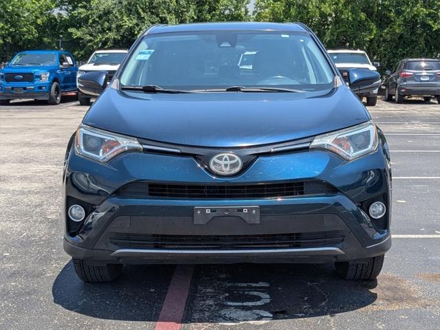 used 2018 Toyota RAV4 car, priced at $15,000