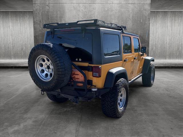 used 2012 Jeep Wrangler Unlimited car, priced at $16,797