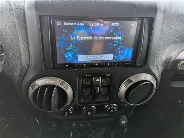 used 2016 Jeep Wrangler Unlimited car, priced at $19,307