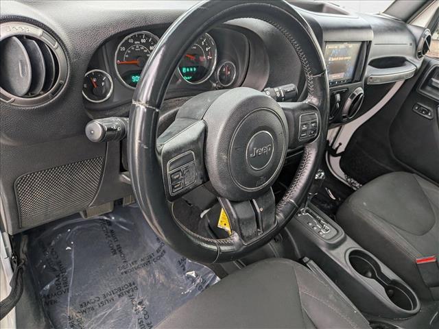 used 2016 Jeep Wrangler Unlimited car, priced at $19,307