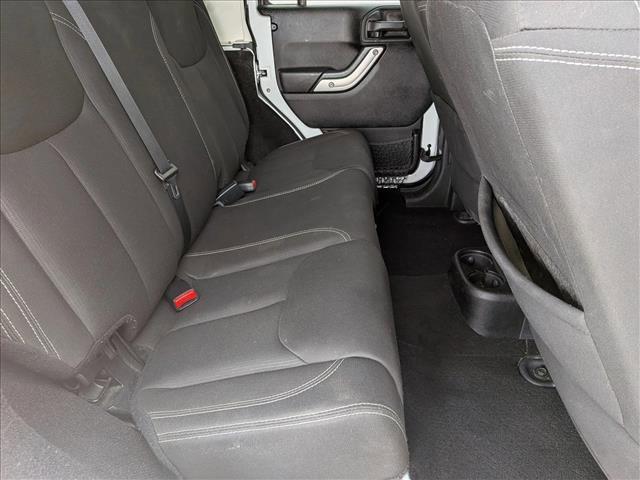 used 2015 Jeep Wrangler Unlimited car, priced at $16,464
