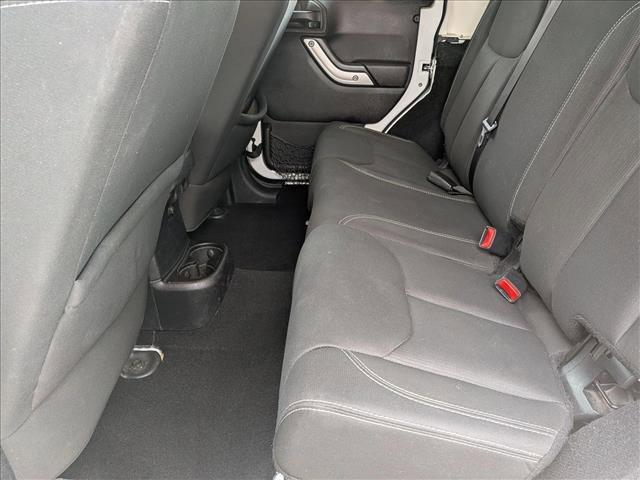 used 2015 Jeep Wrangler Unlimited car, priced at $16,464
