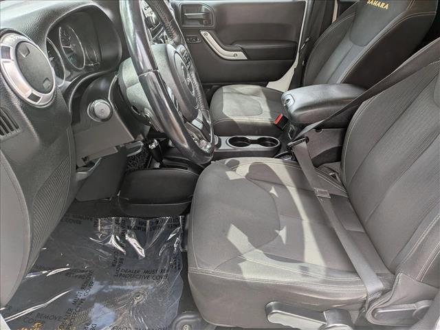 used 2015 Jeep Wrangler Unlimited car, priced at $16,464