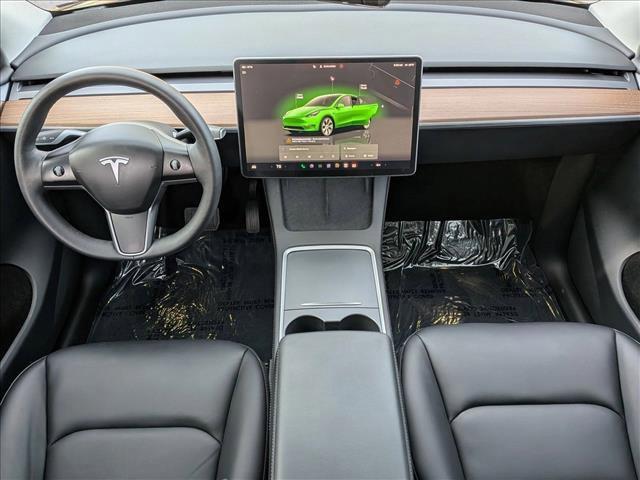 used 2024 Tesla Model Y car, priced at $35,352