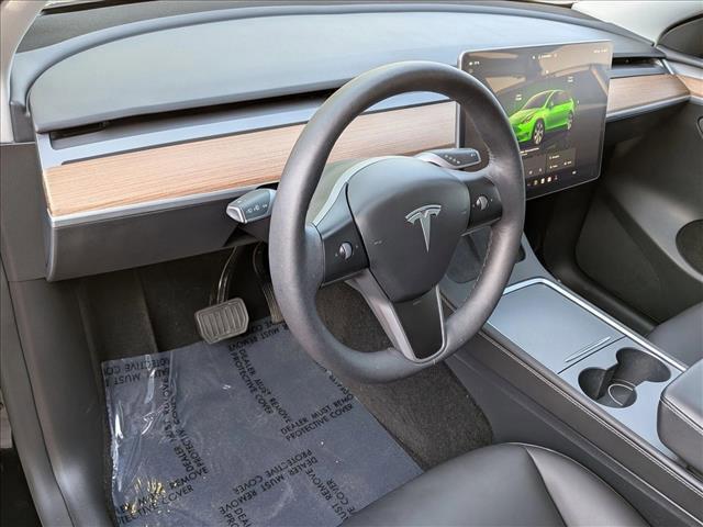 used 2024 Tesla Model Y car, priced at $35,352