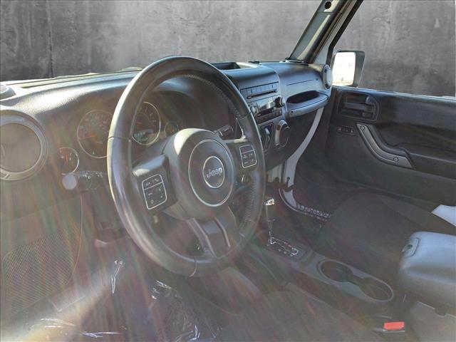 used 2015 Jeep Wrangler Unlimited car, priced at $17,920