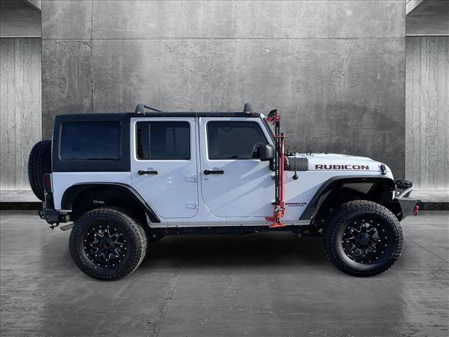 used 2016 Jeep Wrangler Unlimited car, priced at $24,062