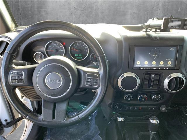 used 2016 Jeep Wrangler Unlimited car, priced at $24,062