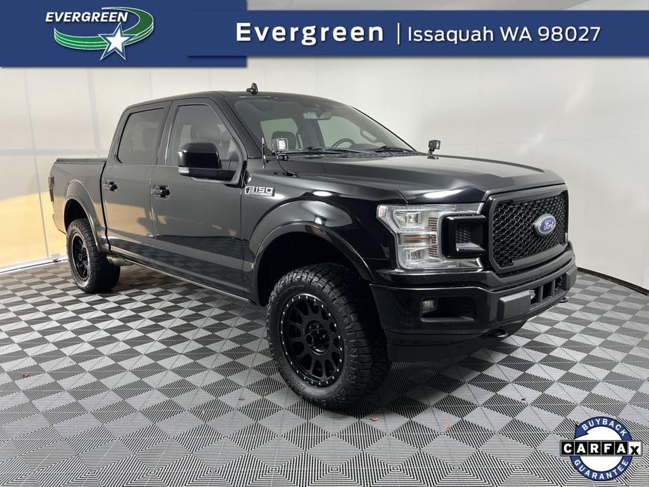 used 2018 Ford F-150 car, priced at $26,701