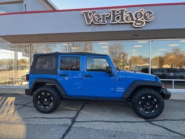 used 2011 Jeep Wrangler Unlimited car, priced at $16,495