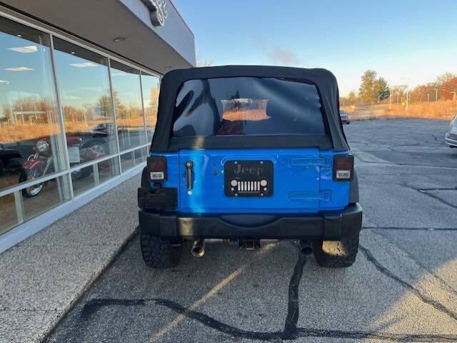 used 2011 Jeep Wrangler Unlimited car, priced at $16,495