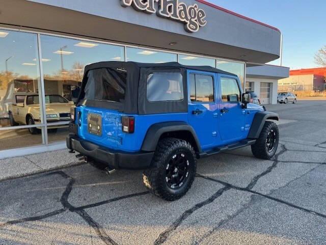 used 2011 Jeep Wrangler Unlimited car, priced at $16,495