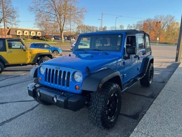 used 2011 Jeep Wrangler Unlimited car, priced at $16,495