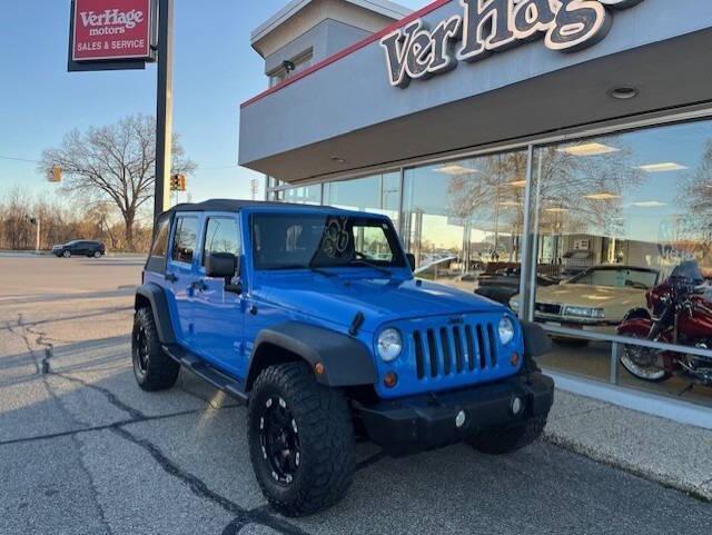 used 2011 Jeep Wrangler Unlimited car, priced at $16,495