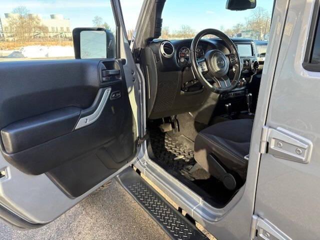 used 2015 Jeep Wrangler Unlimited car, priced at $23,995