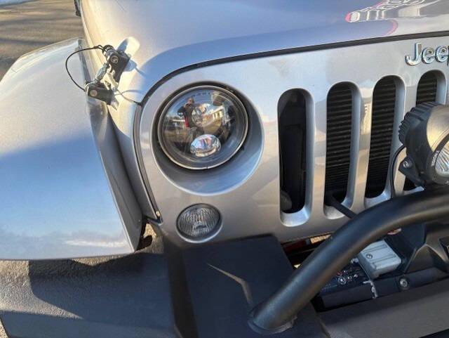 used 2015 Jeep Wrangler Unlimited car, priced at $23,995