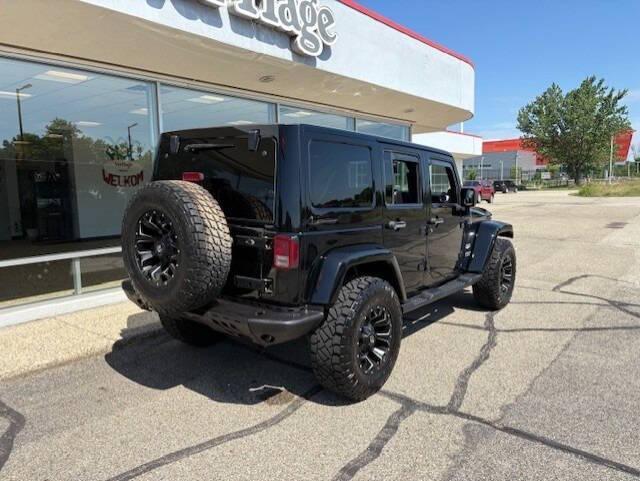 used 2012 Jeep Wrangler Unlimited car, priced at $16,995