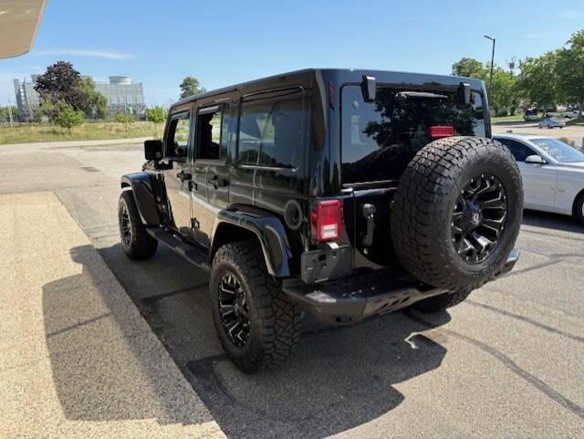 used 2012 Jeep Wrangler Unlimited car, priced at $16,995