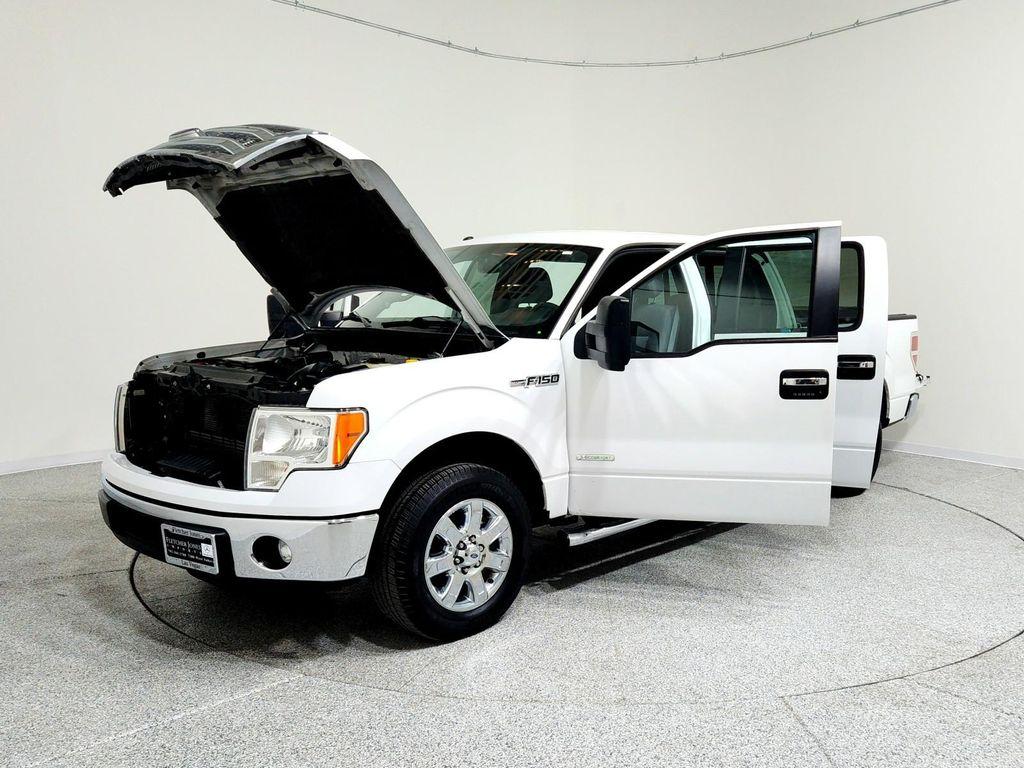 used 2014 Ford F-150 car, priced at $14,594