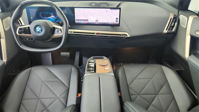 used 2024 BMW iX car, priced at $67,950