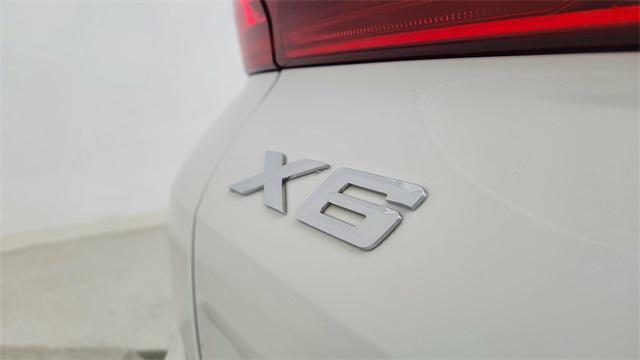 used 2023 BMW X6 car, priced at $59,850