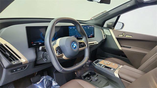 used 2024 BMW iX car, priced at $62,450