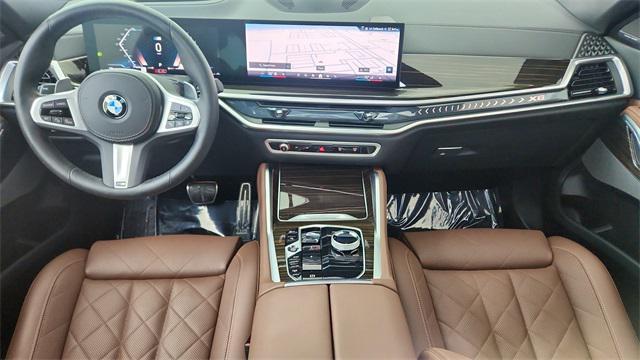 used 2025 BMW X6 car, priced at $65,950