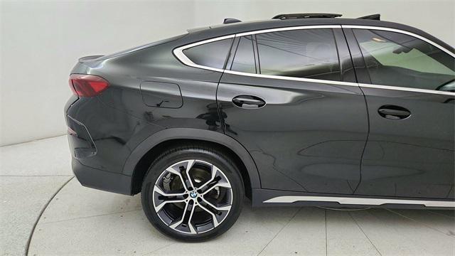 used 2023 BMW X6 car, priced at $57,650