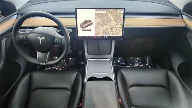 used 2025 Tesla Model Y car, priced at $36,950