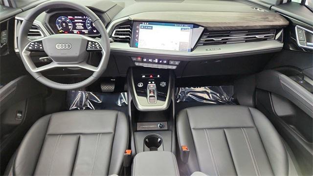 used 2025 Audi Q4 e-tron car, priced at $33,950