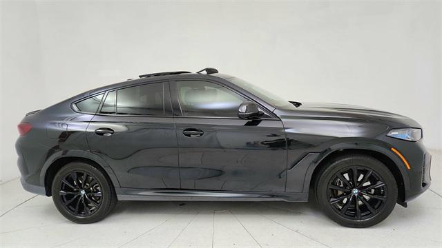 used 2024 BMW X6 car, priced at $59,450