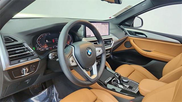 used 2025 BMW X4 car, priced at $42,950