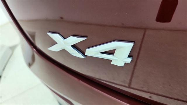 used 2025 BMW X4 car, priced at $42,950