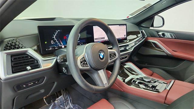 used 2025 BMW X6 car, priced at $69,450