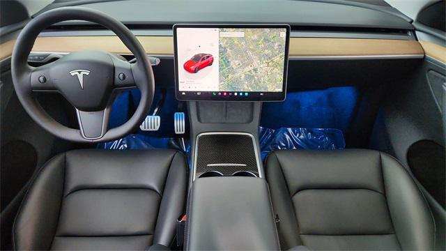 used 2025 Tesla Model Y car, priced at $41,450