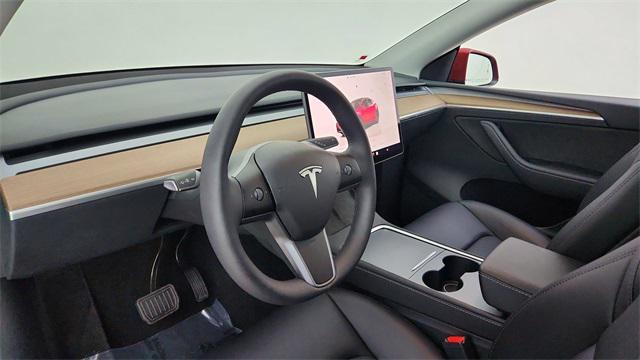 used 2024 Tesla Model Y car, priced at $38,650