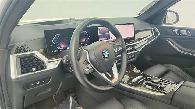 used 2025 BMW X5 car, priced at $64,950