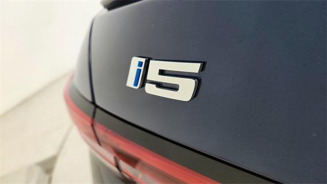 used 2025 BMW i5 car, priced at $52,950